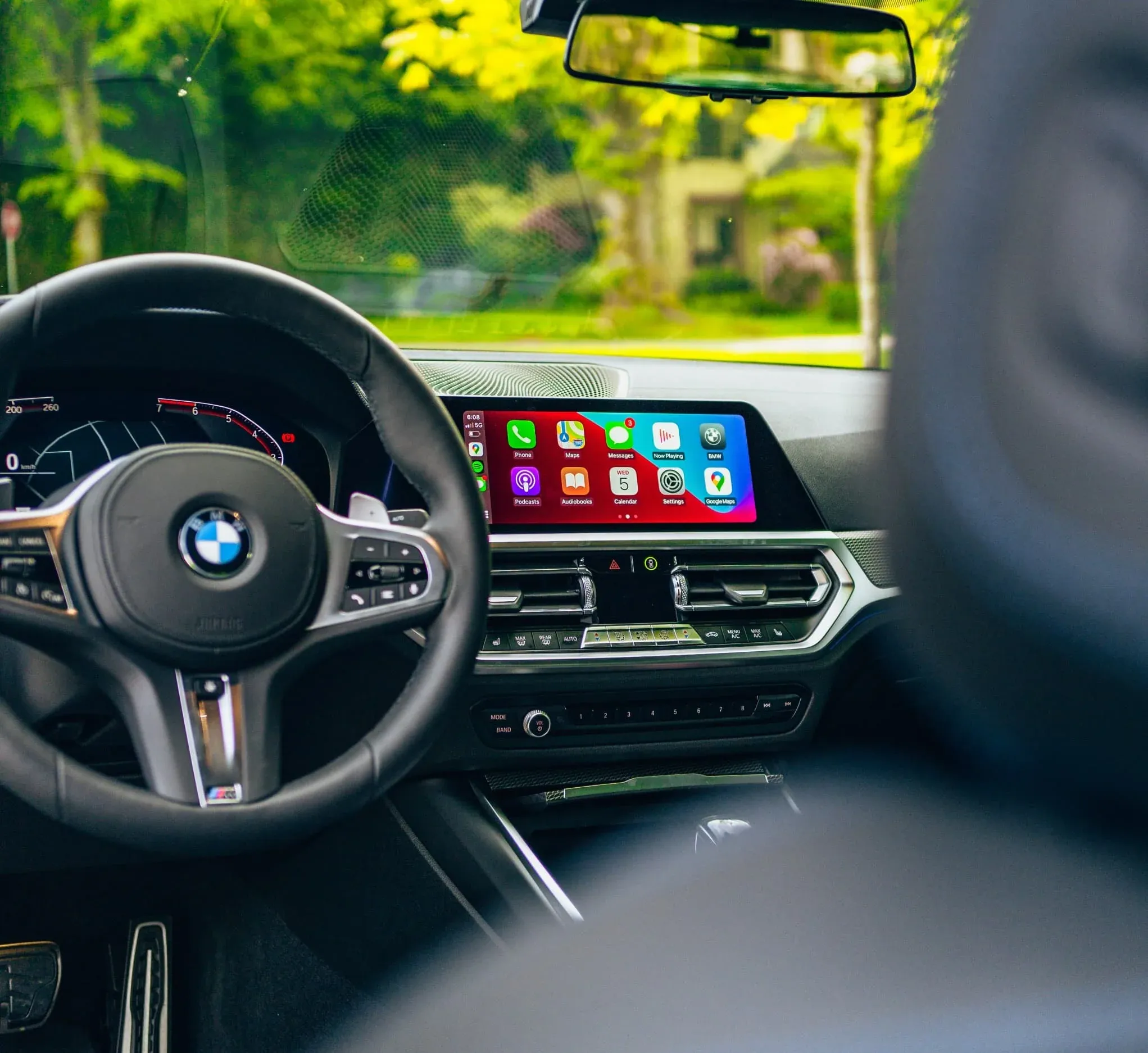 BMW iDrive screen running full-screen Apple CarPlay after module coding — BMW diagnostics and coding at PDXEuroWerks in Portland, Oregon
