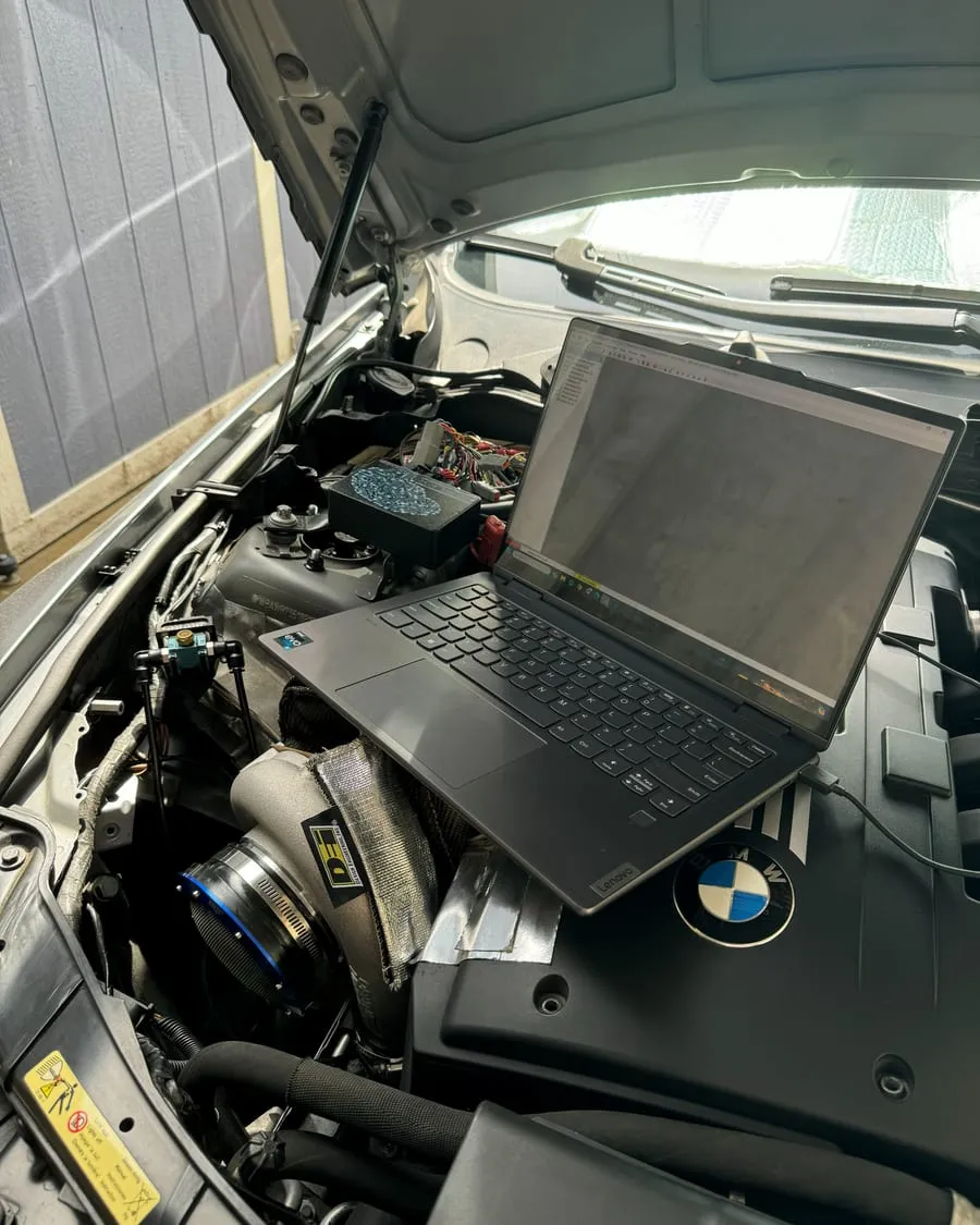 Single-turbo BMW E90 335i getting a Motiv Reflex tune flashed during a BMW coding and performance session at PDXEuroWerks in Portland, OR