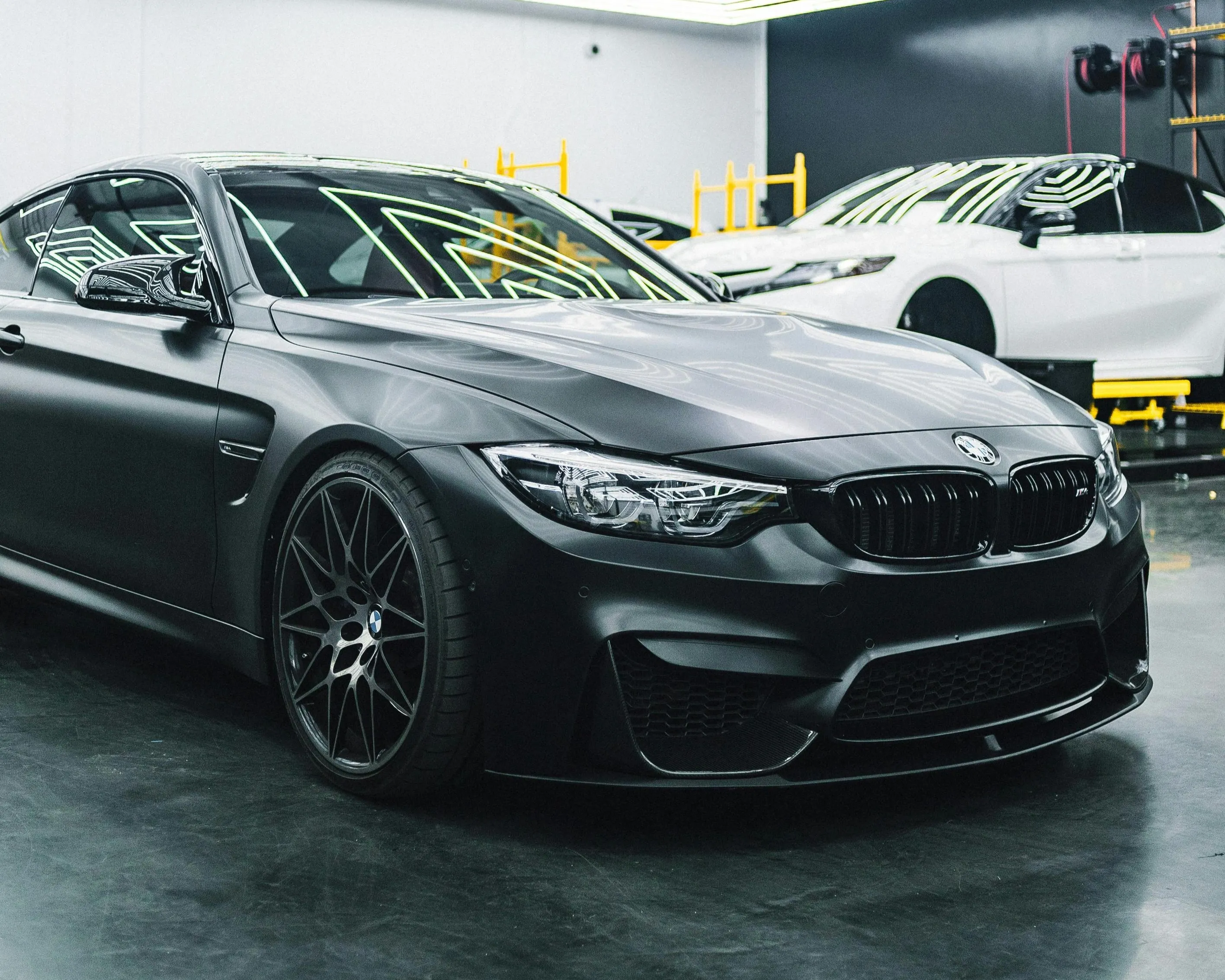 Matte black BMW M4 in for routine maintenance and a full synthetic oil service at PDXEuroWerks in Portland, Oregon